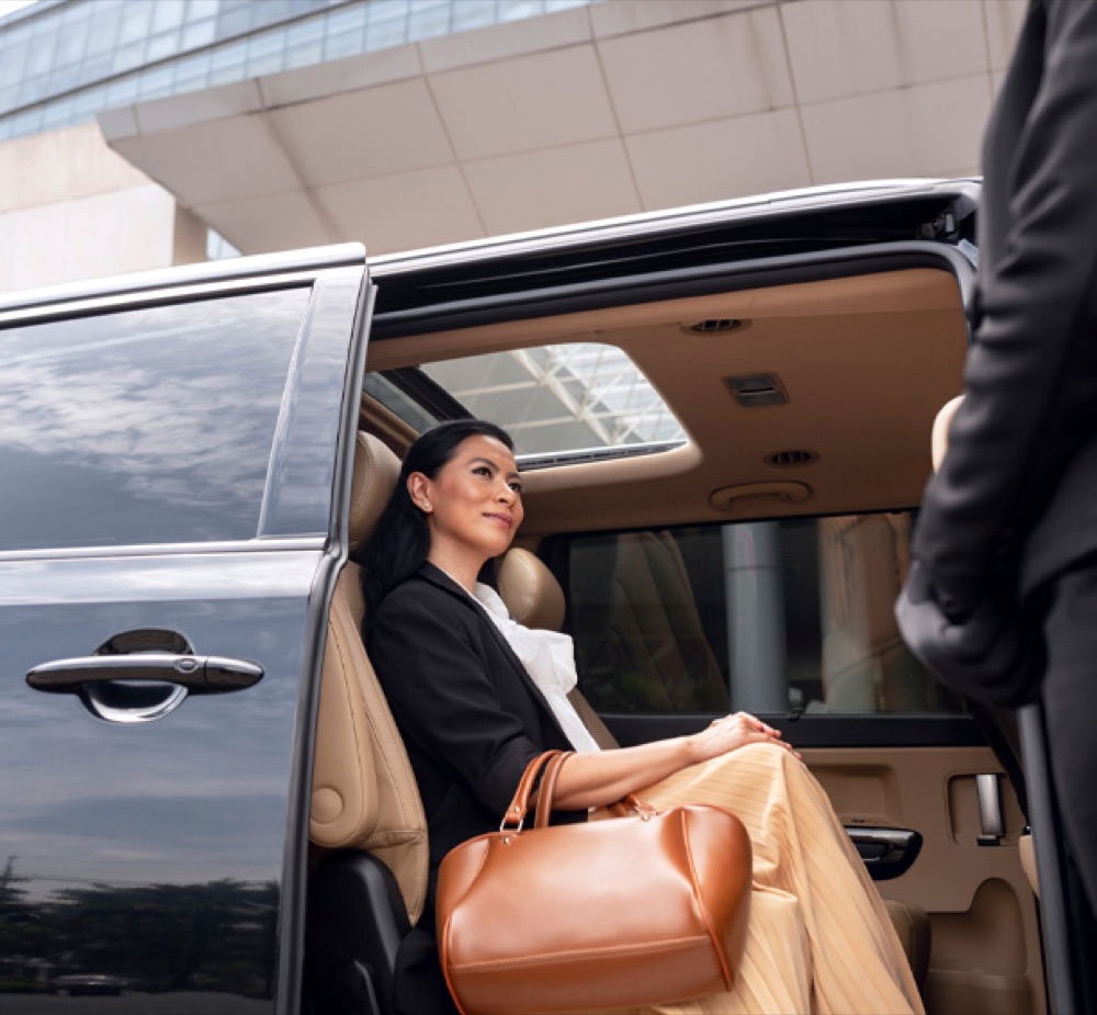 Passenger settling into a City Cabz car